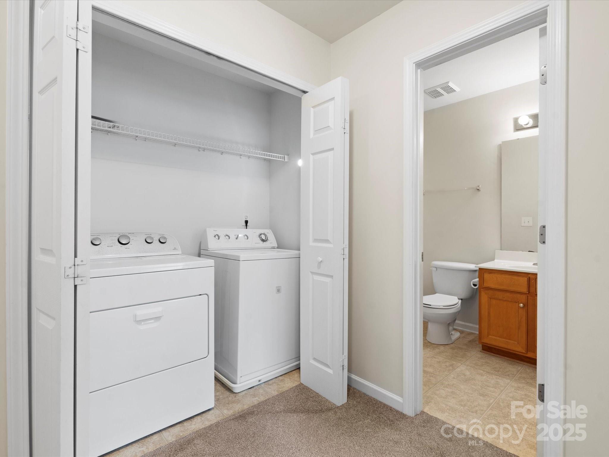 2137 Midnight Blue Lane Fort Mill, SC 29708 - Photo 26 of 40 a bathroom with a sink a toilet and shower