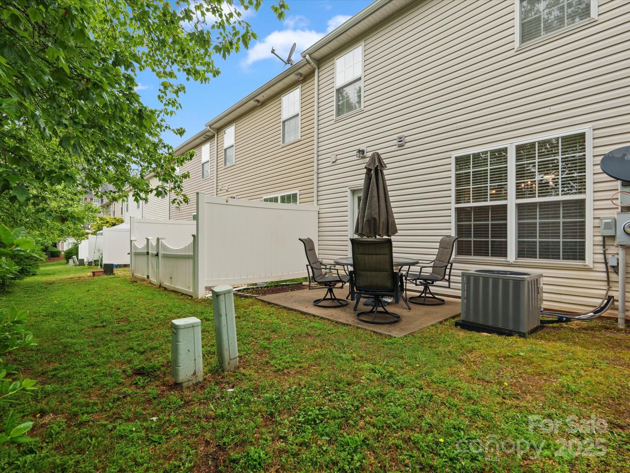 2137 Midnight Blue Lane Fort Mill, SC 29708 - Photo 31 of 40 a view of a house with backyard and sitting area