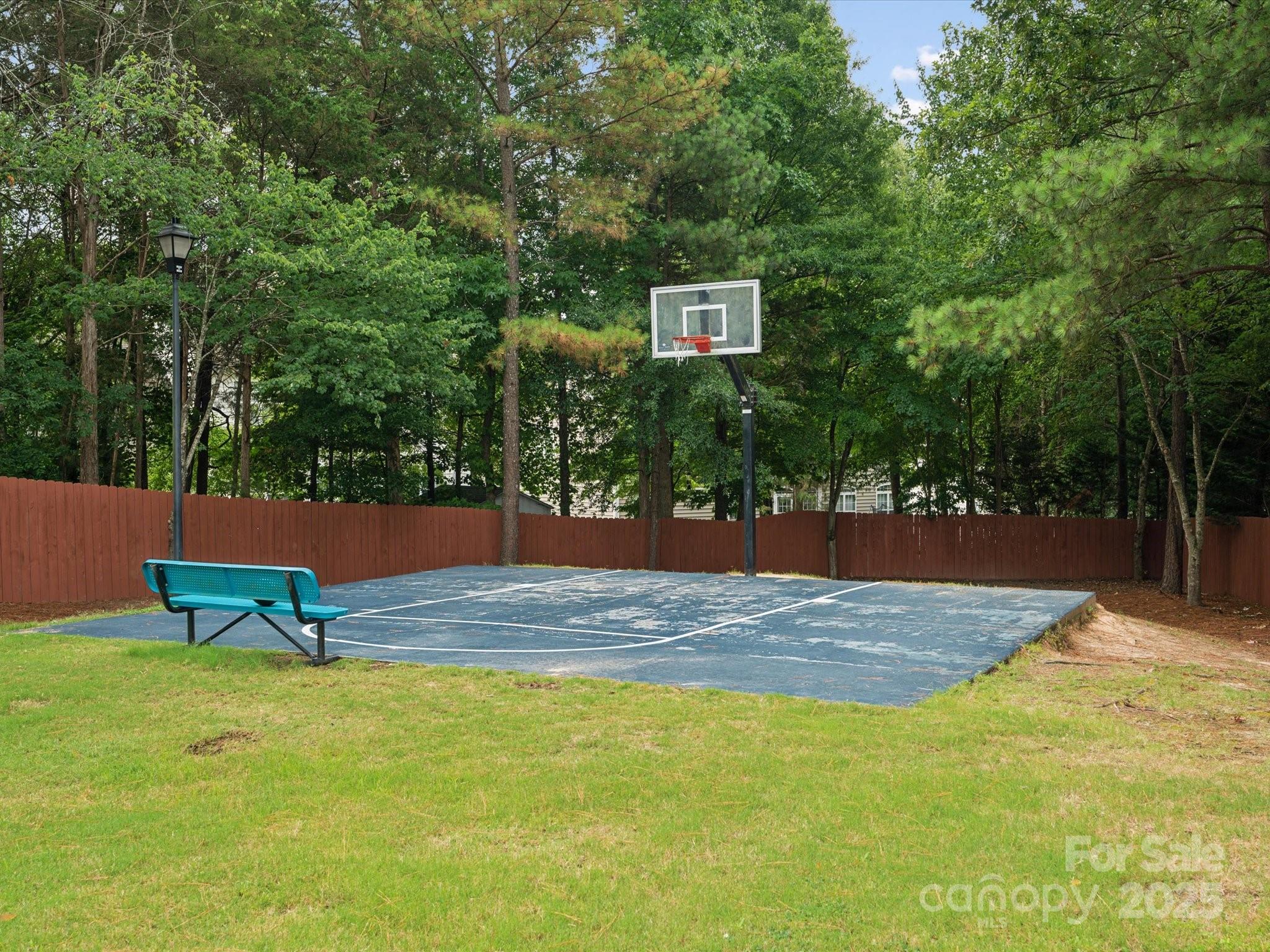 2137 Midnight Blue Lane Fort Mill, SC 29708 - Photo 36 of 40 a view of a swimming pool with a bench