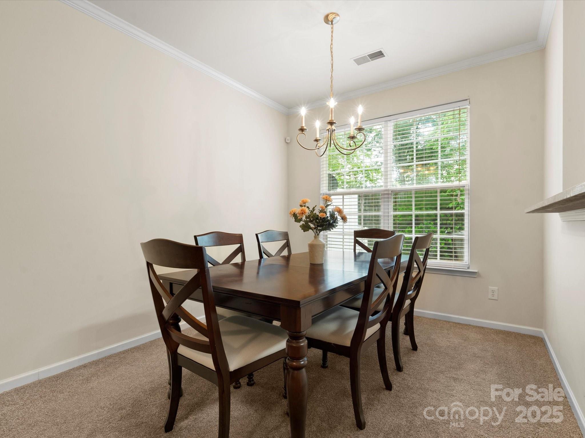 2137 Midnight Blue Lane Fort Mill, SC 29708 - Photo 4 of 40 a view of a dining room with furniture window and outside view