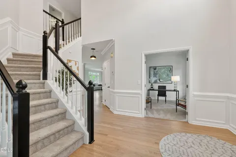 a view of entryway with flower and stairs