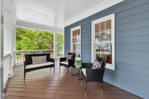 a picture of a bench in front of a wall