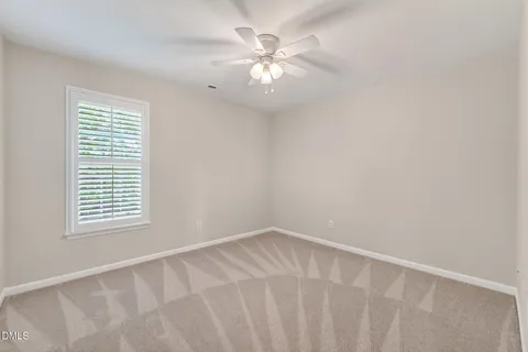 a view of a lake with a building in the background