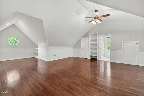 a picture of a bench in front of a gate