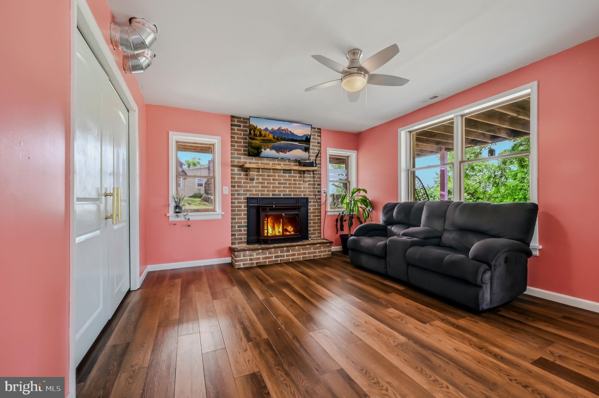 210 Elk View Road North East, MD 21901 - Photo 23 of 64 a living room with furniture and a fireplace
