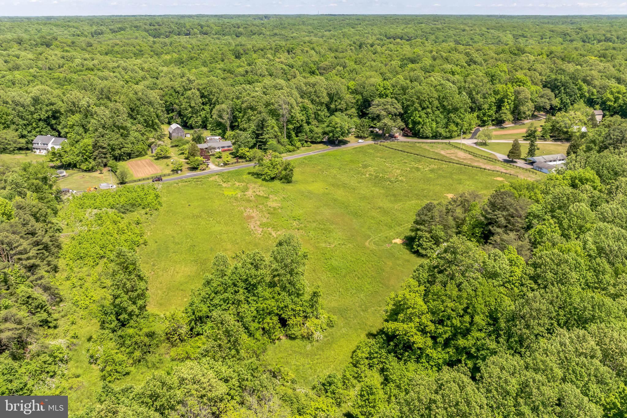 2195 Henry Hutchins Road Prince Frederick, MD 20678 - Photo 17 of 25 an aerial view of residential houses with outdoor space and trees