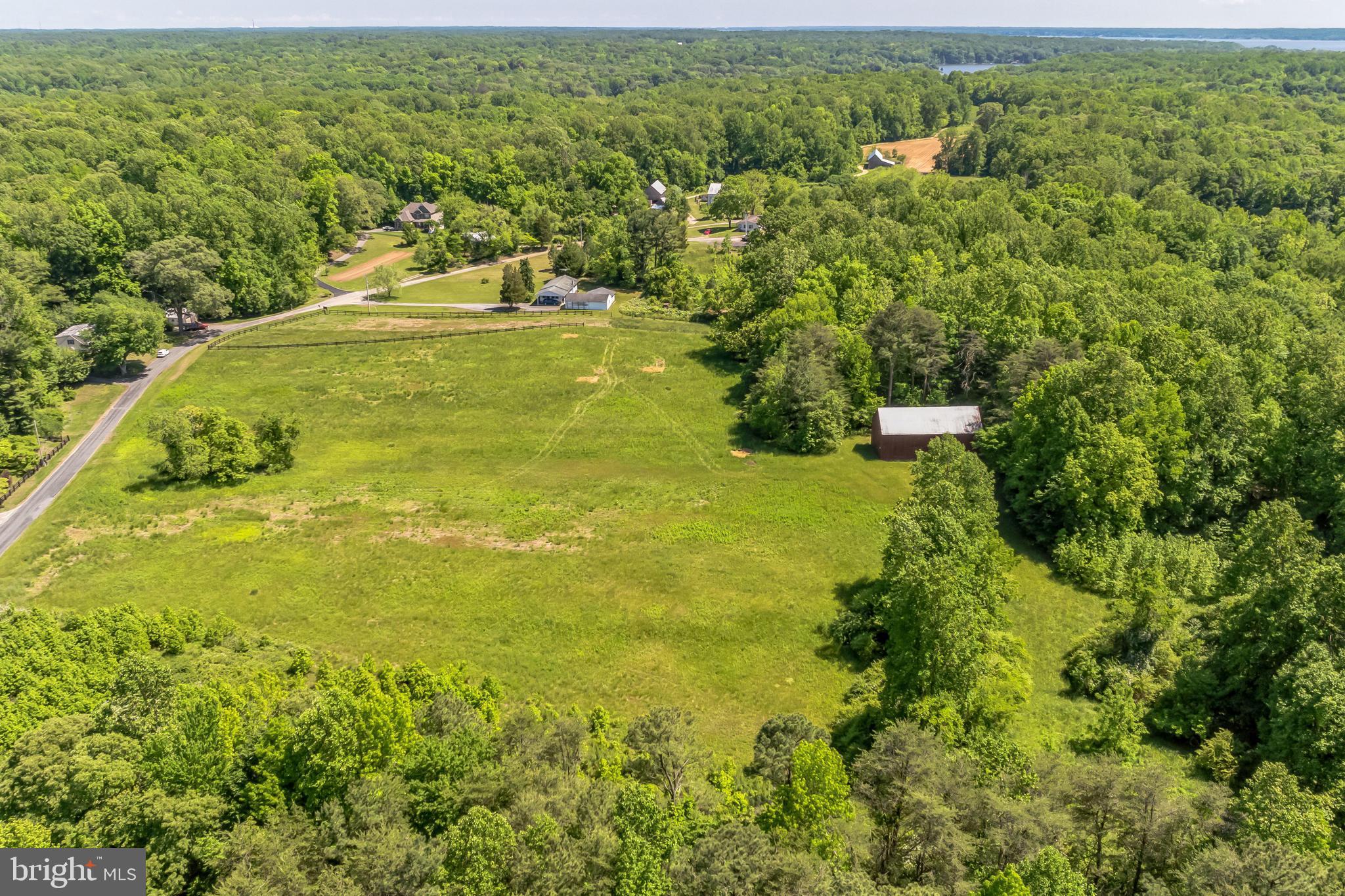 2195 Henry Hutchins Road Prince Frederick, MD 20678 - Photo 20 of 25 a view of a lake with a city