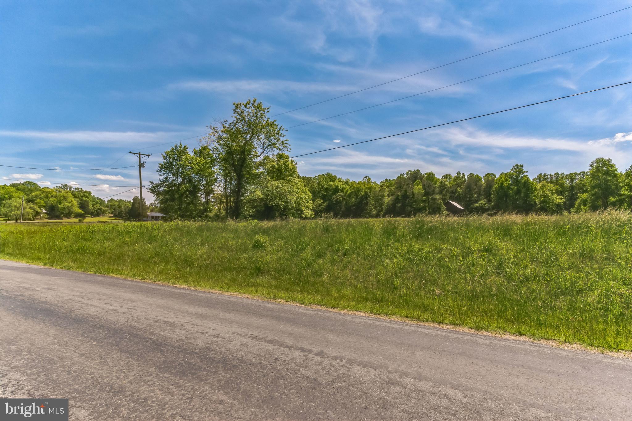 2195 Henry Hutchins Road Prince Frederick, MD 20678 - Photo 24 of 25 a view of a lake with a big yard