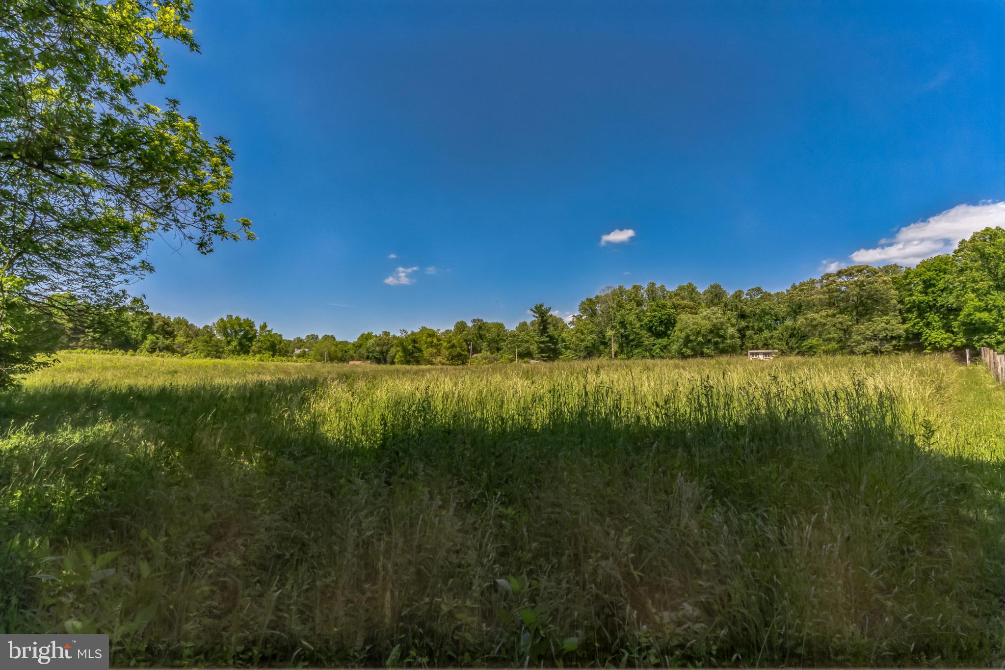 2195 Henry Hutchins Road Prince Frederick, MD 20678 - Photo 3 of 25 a view of lake and green space