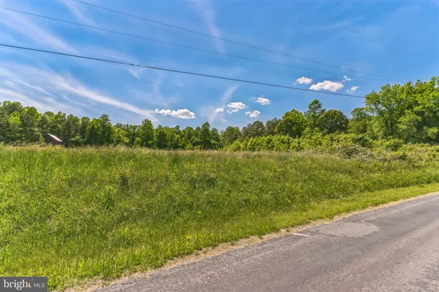 a view of a lake with a big yard