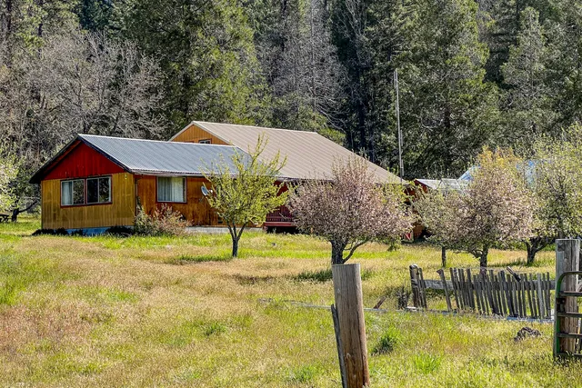 a view of a car parked in front of a house