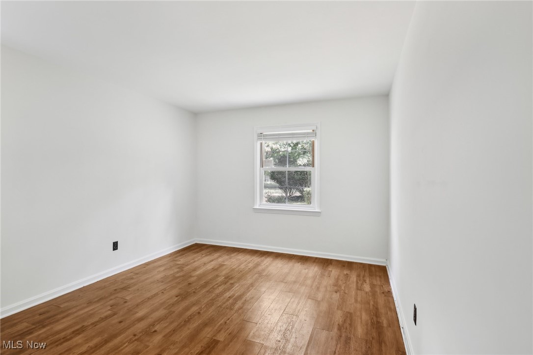 1042 Renfield Road Cleveland Heights, OH 44121 - Photo 15 of 49 Empty room with hardwood / wood-style floors