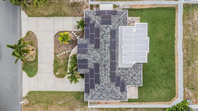 front view of a house with a fountain