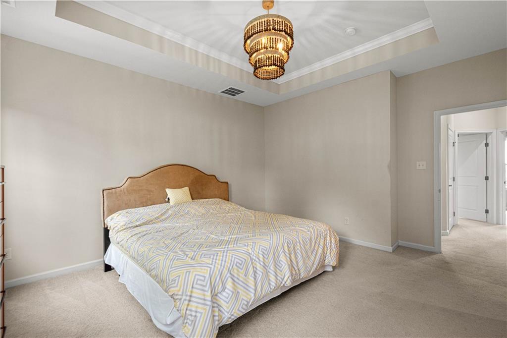 152-160 Cole Drive McKees Rocks, PA 15136 - Photo 20 of 39 a bedroom with a bed and a clock on the wall