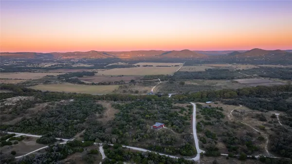 a view of lake with green space