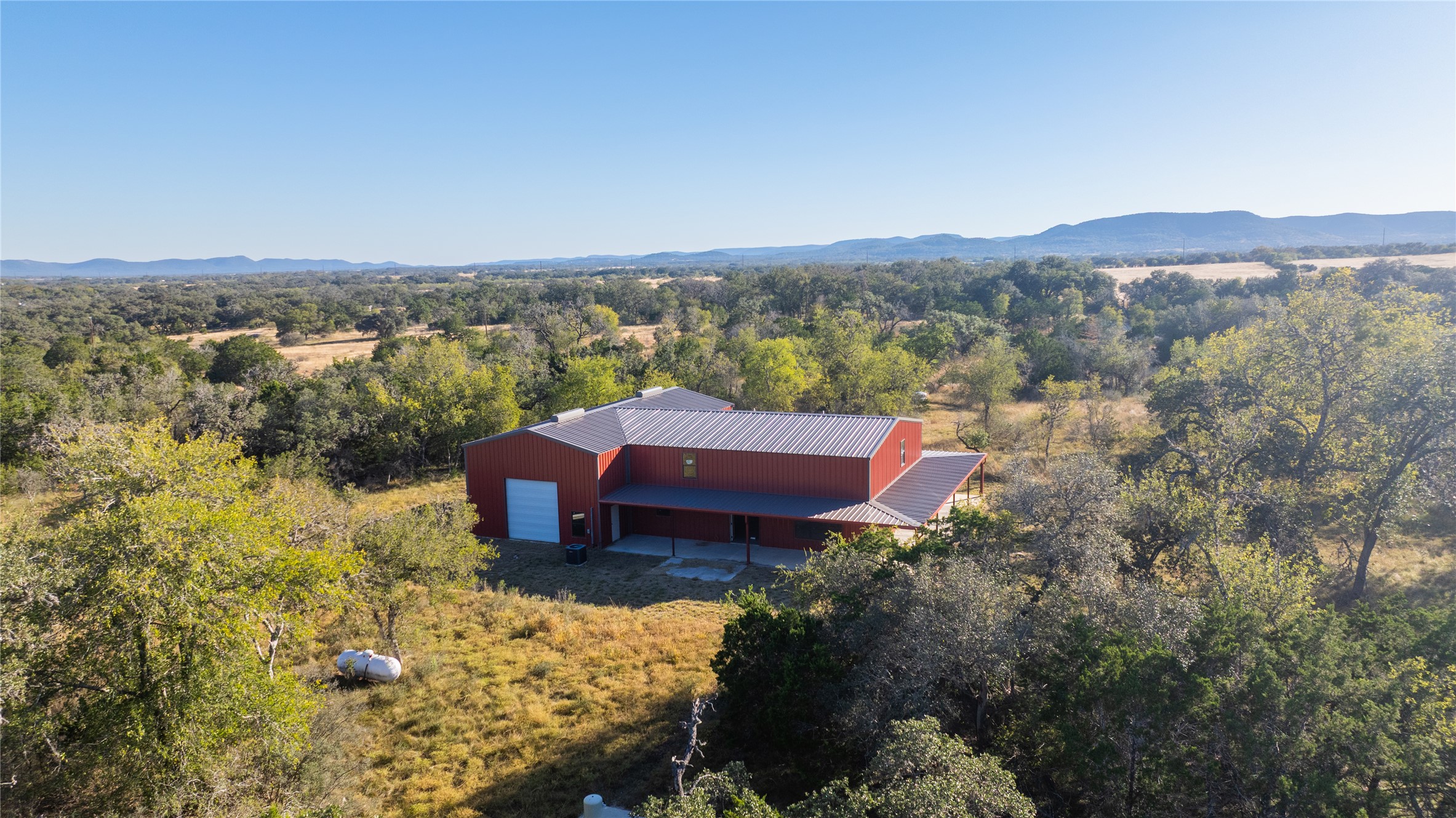 358 Cornelius Road Utopia, TX 78884 - Photo 5 of 33 an aerial view of a house with a garden
