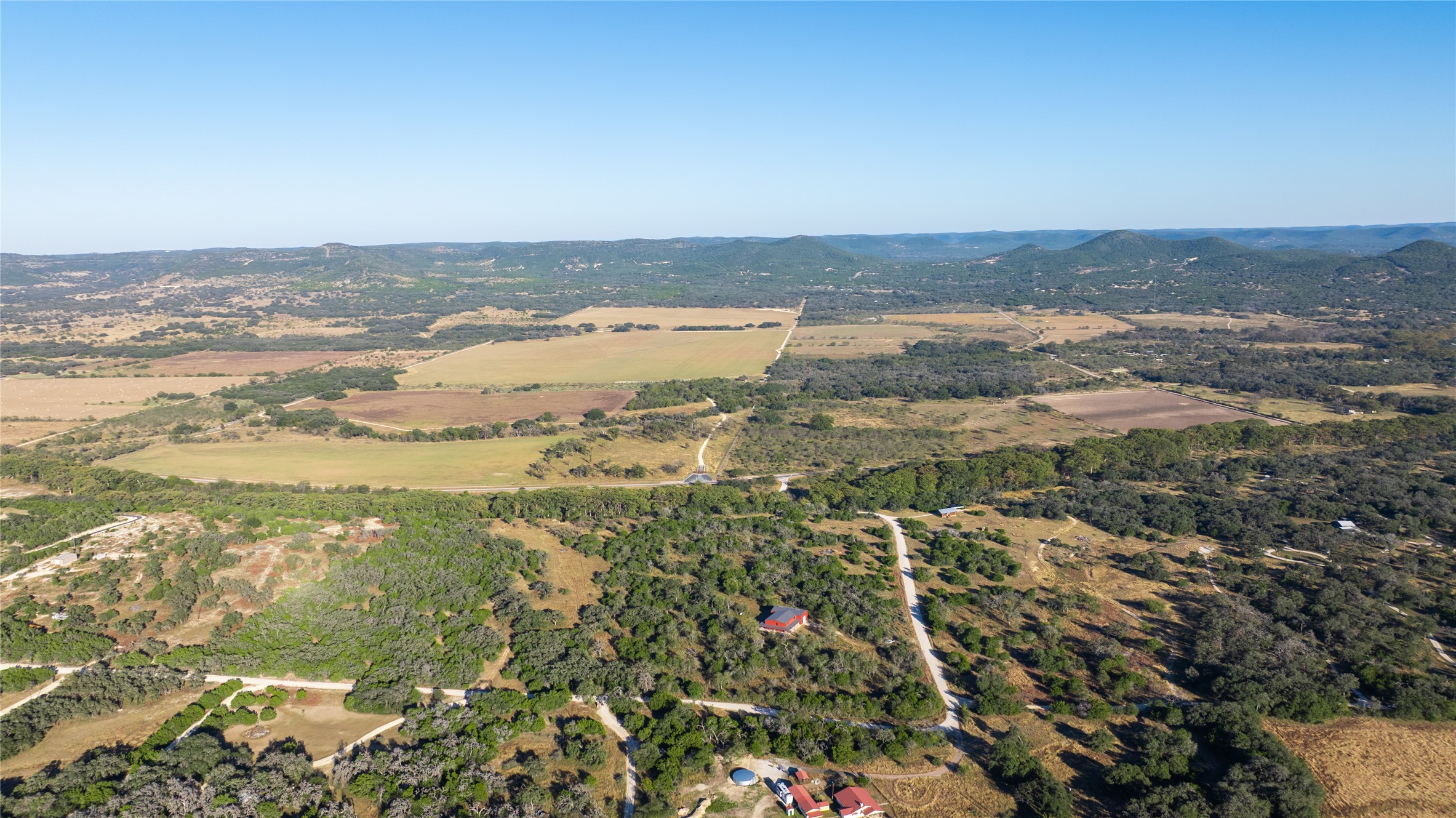 358 Cornelius Road Utopia, TX 78884 - Photo 9 of 33 an aerial view of ocean and residential houses with outdoor space