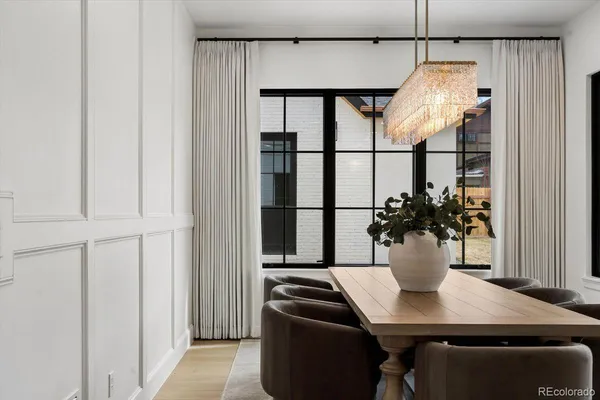 a view of a dining table and chairs in the room