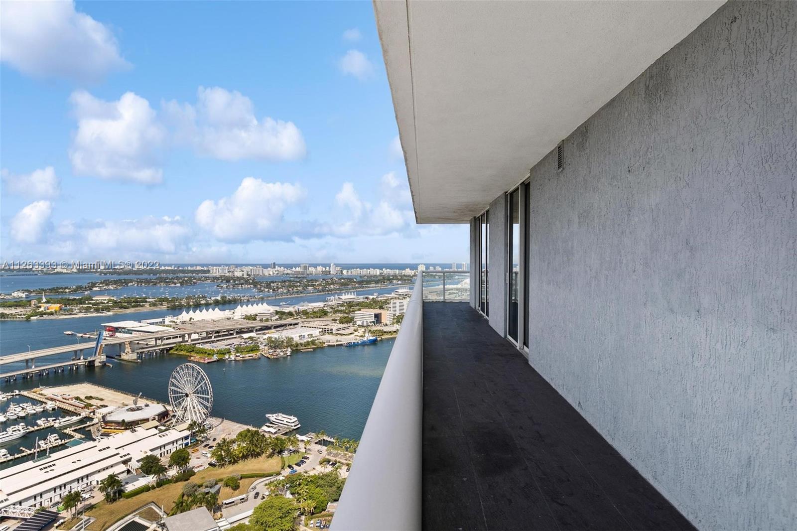 50 Biscayne Boulevard, Unit 4802 Miami, FL 33132 - Photo 32 of 33 a view of a lake from a balcony