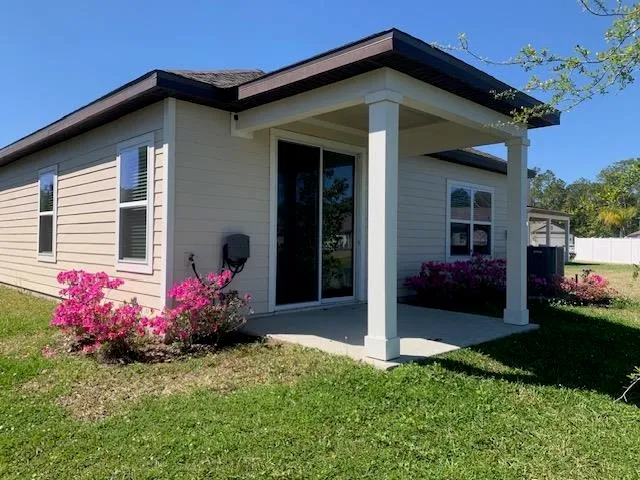 a front view of a house with yard