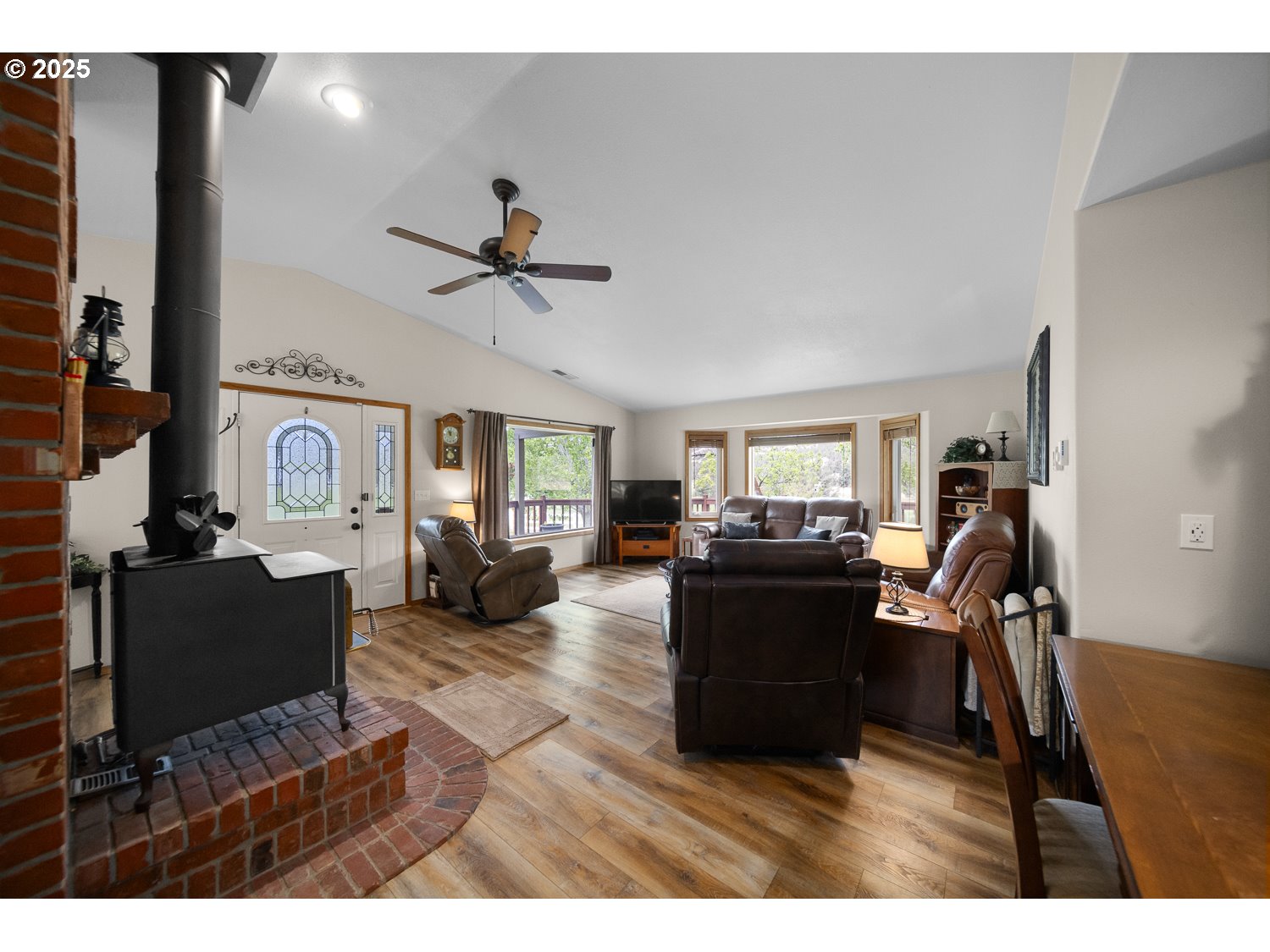 33817 Gage Road Mitchell, OR 97750 - Photo 13 of 48 a living room with furniture and a flat screen tv