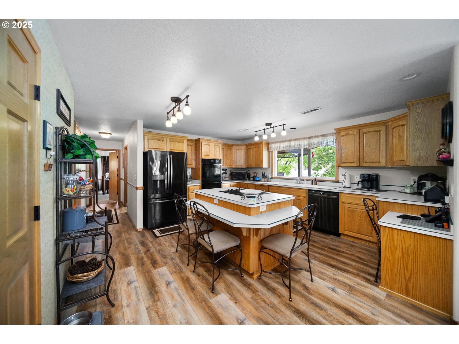 33817 Gage Road Mitchell, OR 97750 - Photo 14 of 48 a kitchen with a table and chairs in it