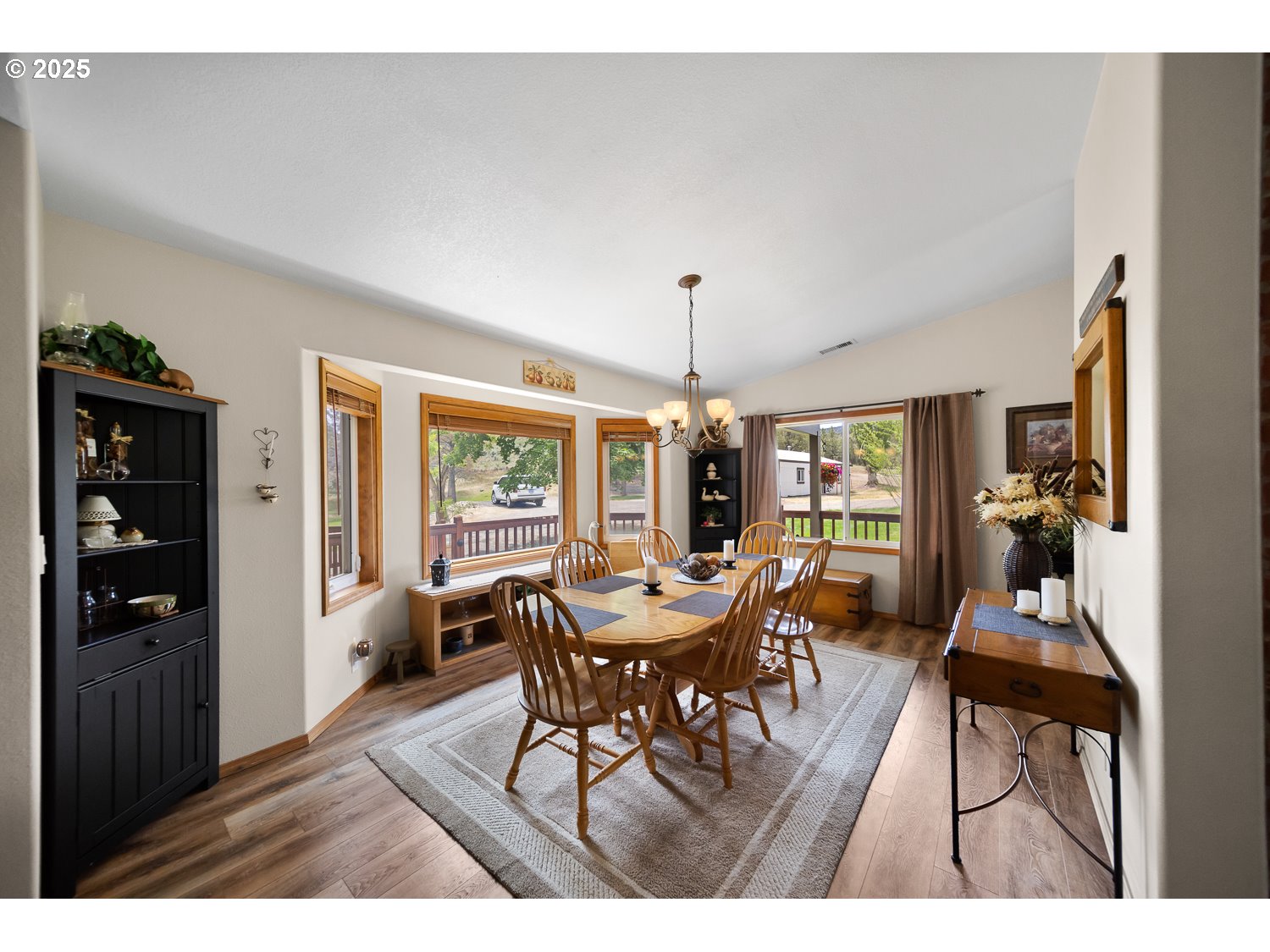 33817 Gage Road Mitchell, OR 97750 - Photo 17 of 48 a view of a dining room with furniture window and outside view