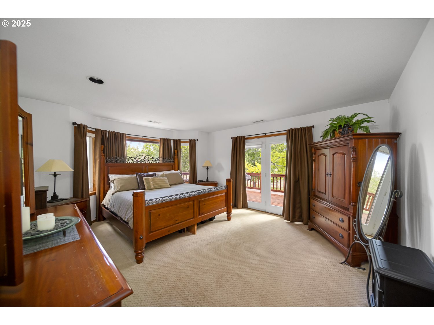 33817 Gage Road Mitchell, OR 97750 - Photo 19 of 48 a bedroom with a bed window and a chandelier