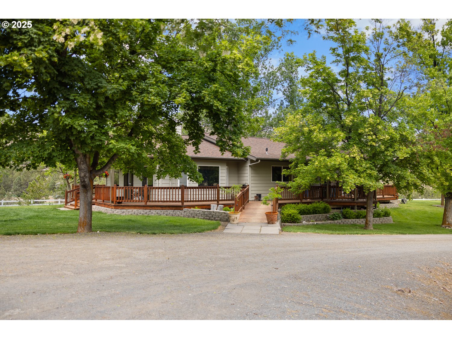 33817 Gage Road Mitchell, OR 97750 - Photo 31 of 48 a view of a house with backyard and a tree