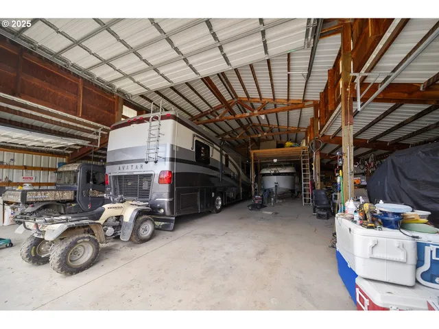 a view of parking garage with cars