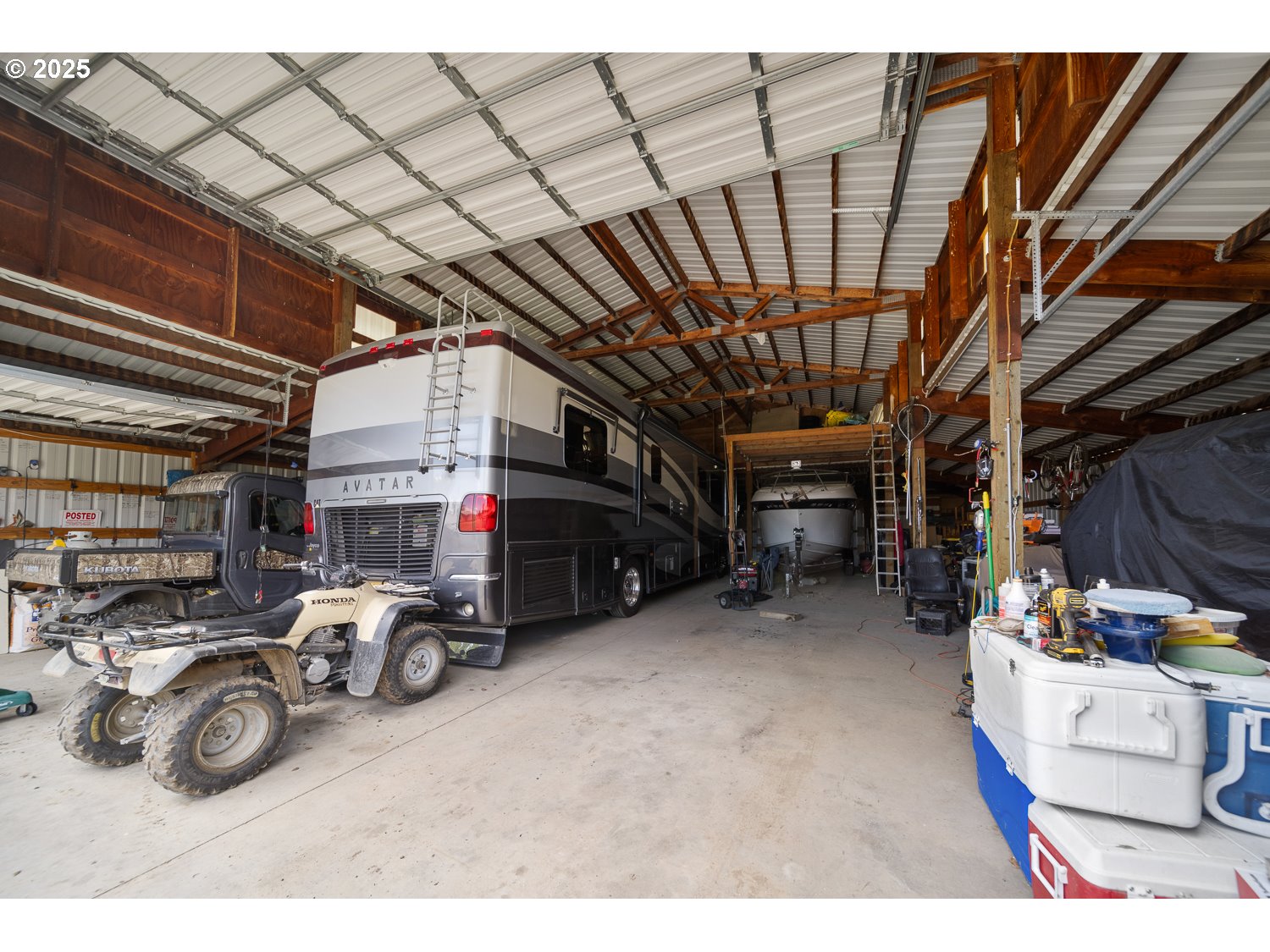 33817 Gage Road Mitchell, OR 97750 - Photo 34 of 48 a view of parking garage with cars