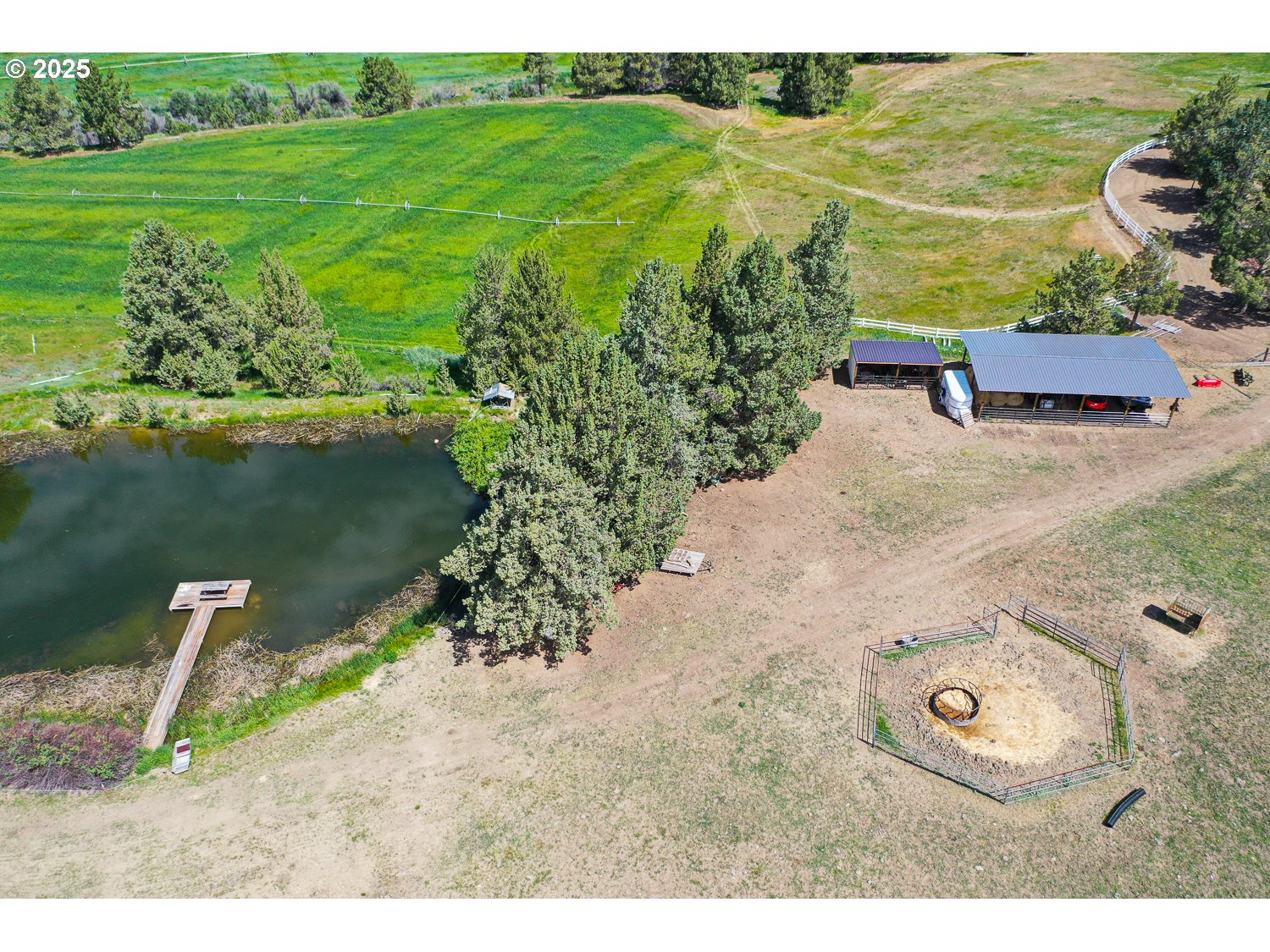 33817 Gage Road Mitchell, OR 97750 - Photo 39 of 48 a view of a lake with a yard