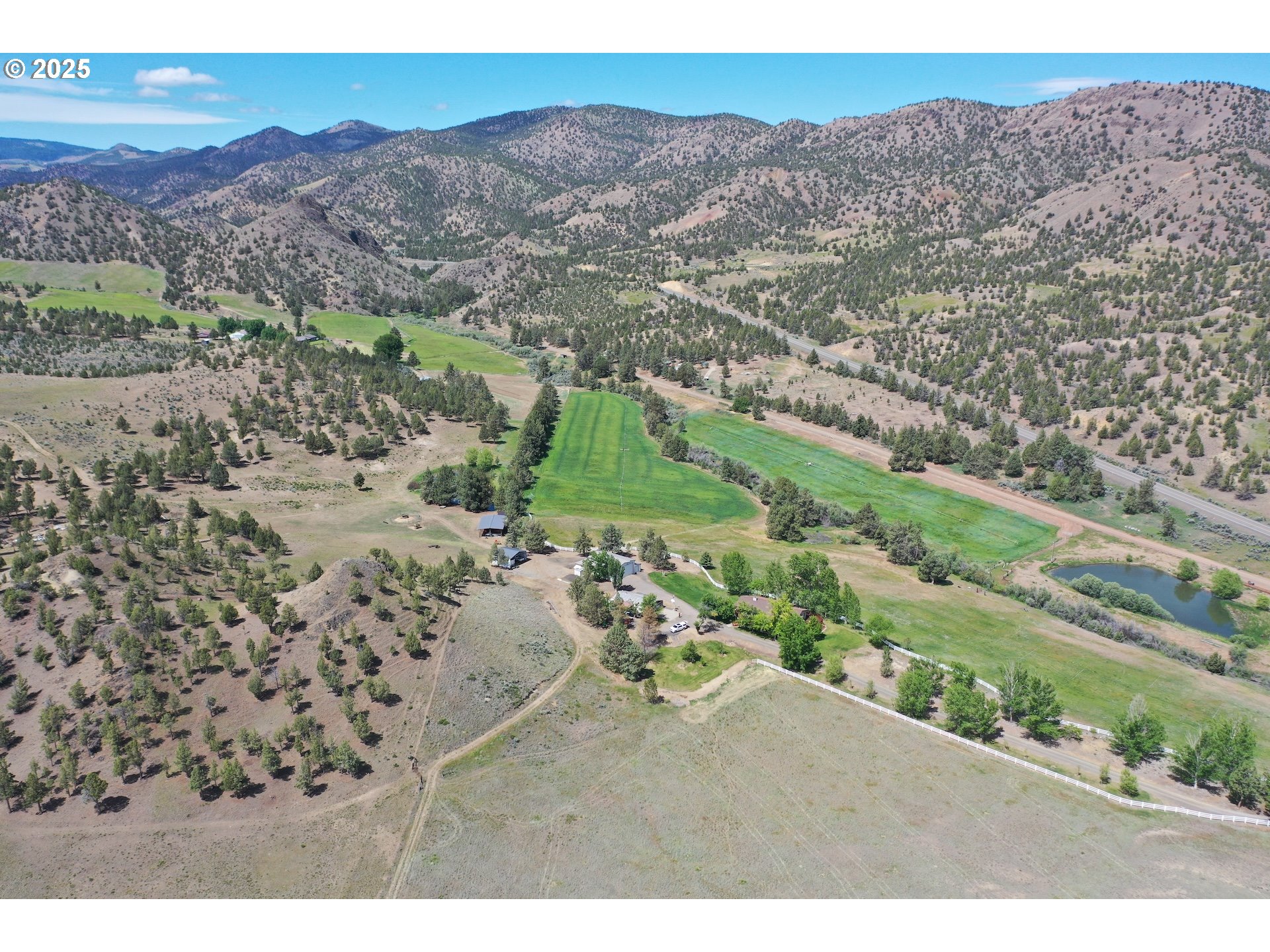 33817 Gage Road Mitchell, OR 97750 - Photo 4 of 48 a view of a city with mountain