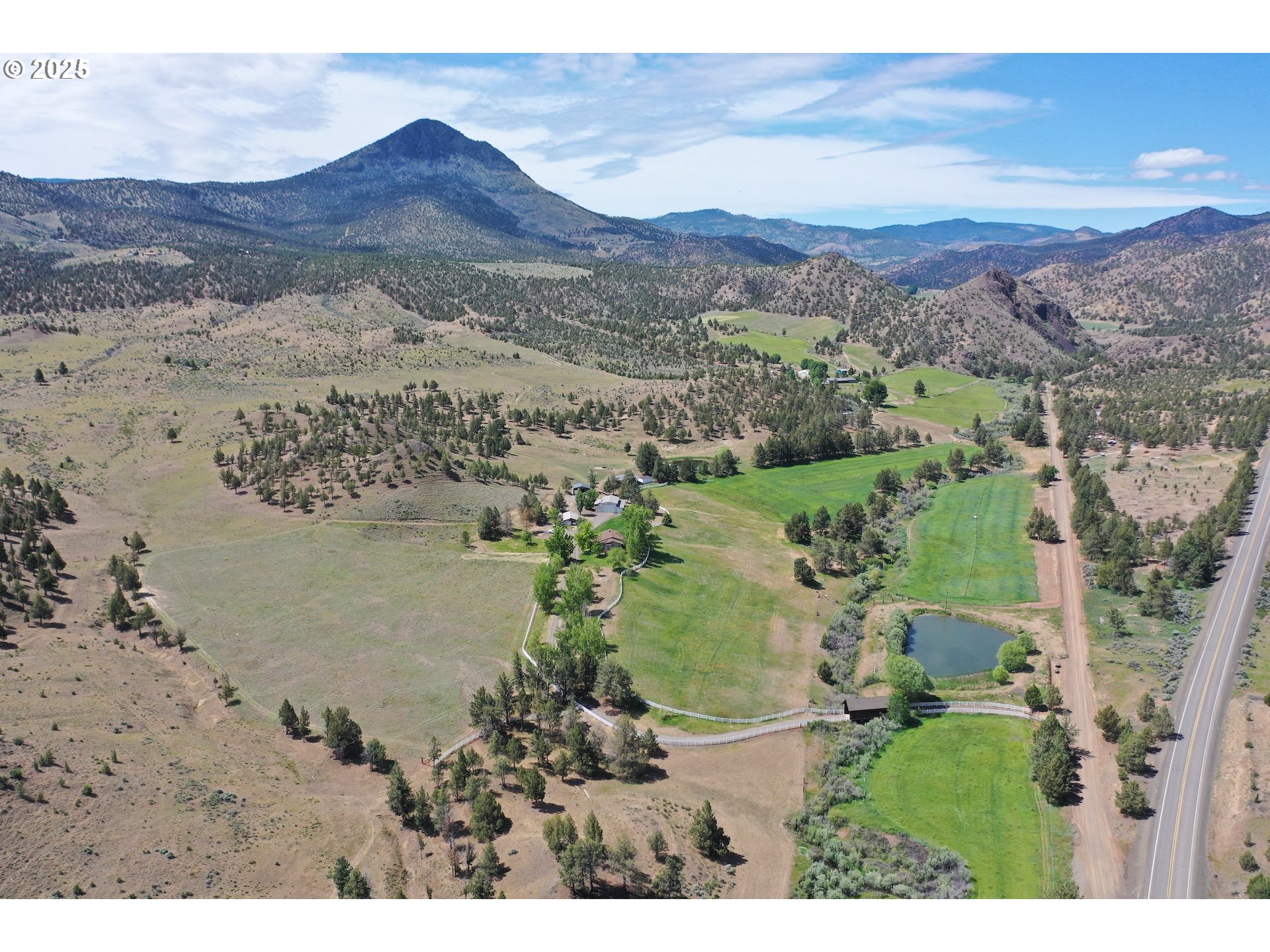 33817 Gage Road Mitchell, OR 97750 - Photo 5 of 48 a view of a lake with mountains in the background