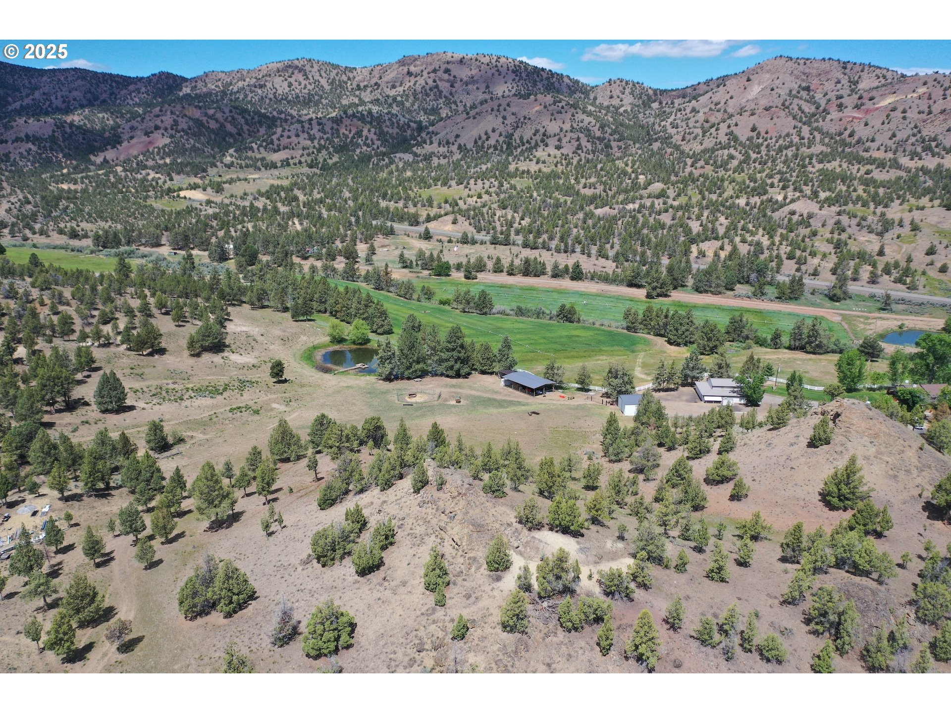 33817 Gage Road Mitchell, OR 97750 - Photo 7 of 48 an aerial view of a house with a yard