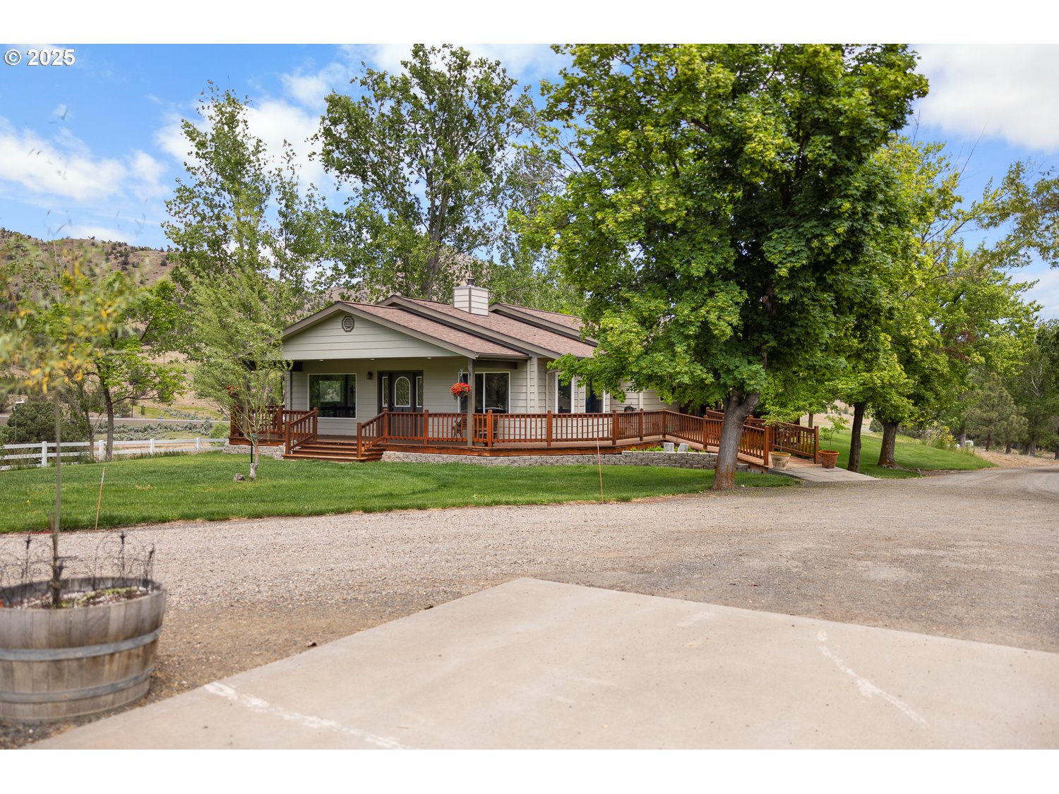 33817 Gage Road Mitchell, OR 97750 - Photo 8 of 48 a front view of a house with a yard and garage