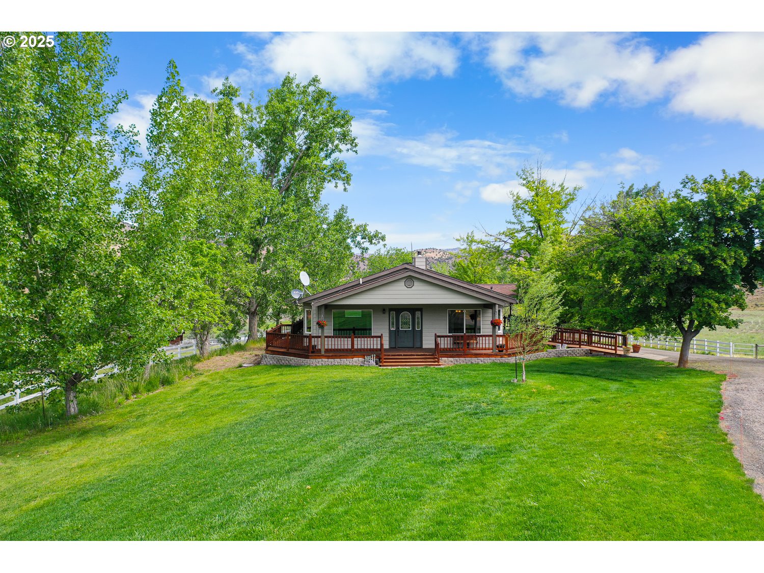 33817 Gage Road Mitchell, OR 97750 - Photo 9 of 48 a view of a house with a yard