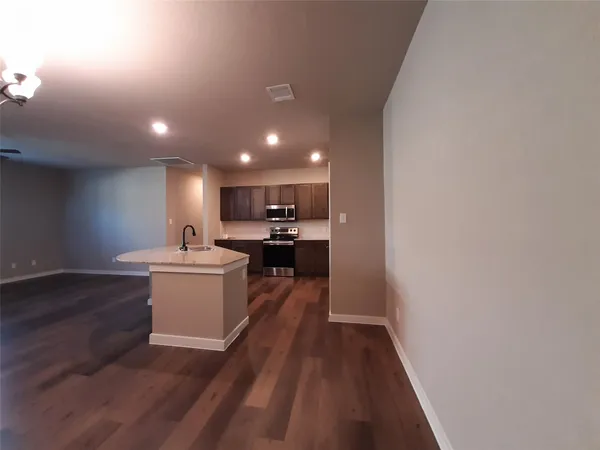 a view of kitchen and sink