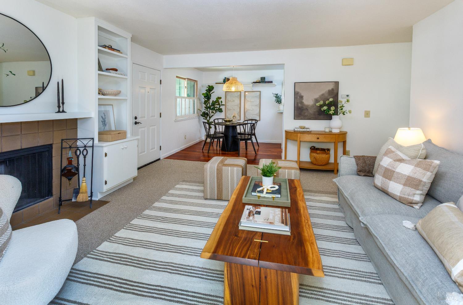 130 Agua Caliente Road West Sonoma, CA 95476 - Photo 2 of 17 a living room with furniture and a fireplace