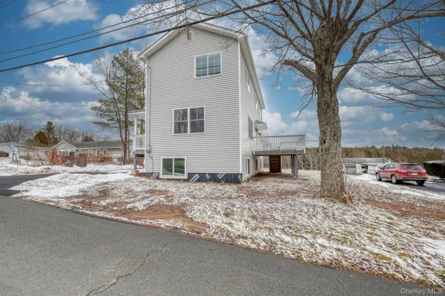 a view of a backyard of the house