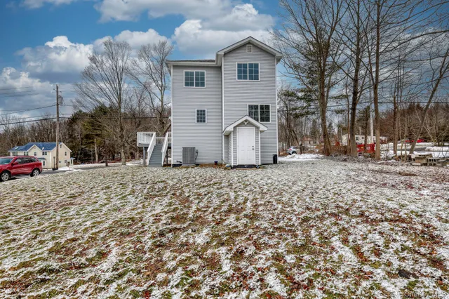 a view of street with of a house