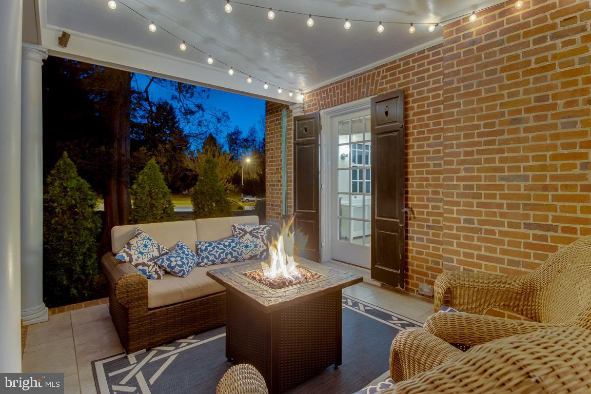 5803 Roland Avenue Baltimore, MD 21210 - Photo 51 of 75 Covered side porch for cozy evenings