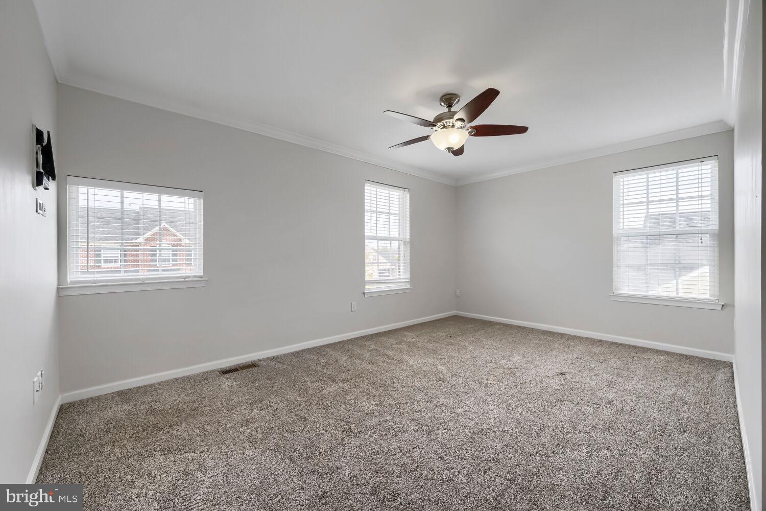 4216 Cross Spring Drive Nottingham, MD 21236 - Photo 29 of 47 a view of room with a ceiling fan and hardwood floor