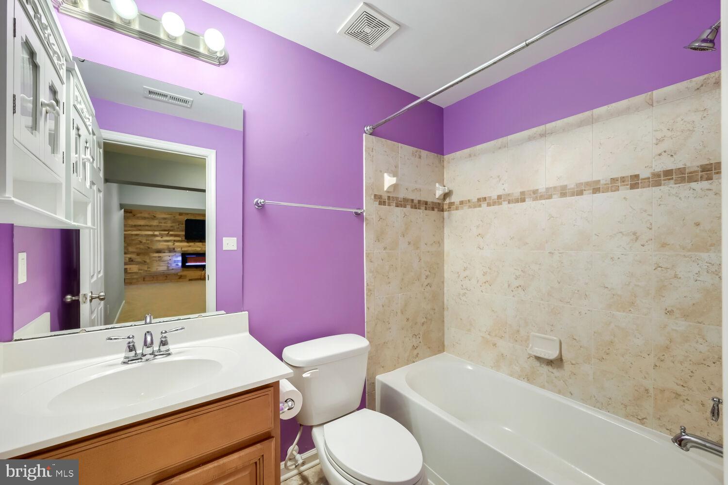 4216 Cross Spring Drive Nottingham, MD 21236 - Photo 33 of 47 a bathroom with a sink vanity mirror and toilet