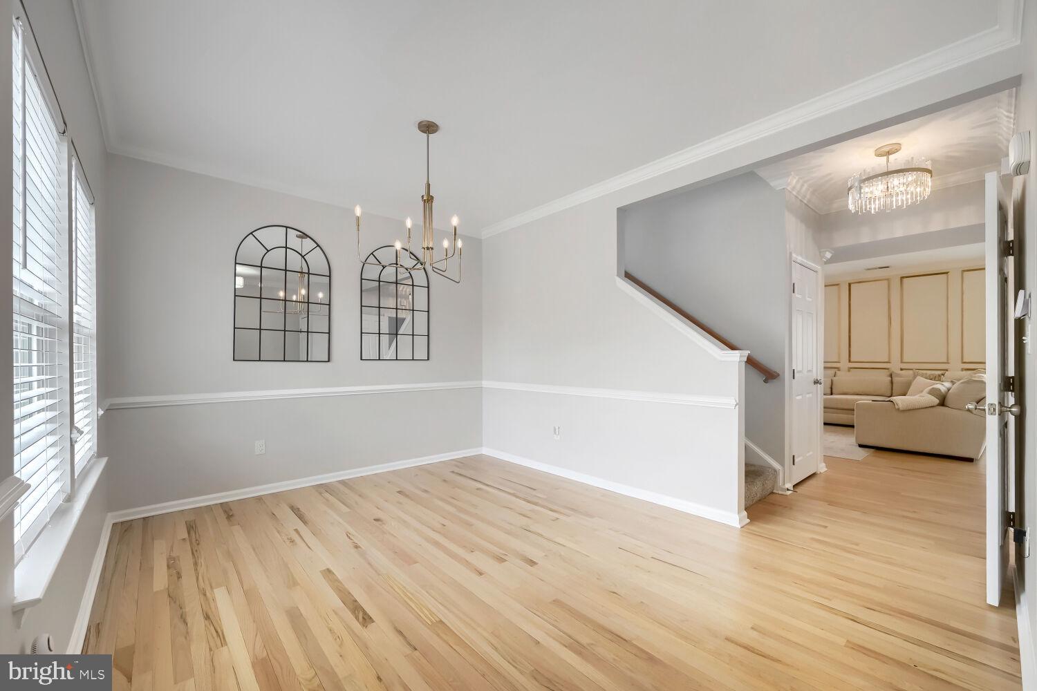 4216 Cross Spring Drive Nottingham, MD 21236 - Photo 7 of 47 wooden floor in an empty room with a window