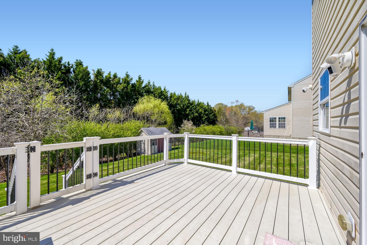 4216 Cross Spring Drive Nottingham, MD 21236 - Photo 7 of 21 Sunny deck with lush green backdrop.