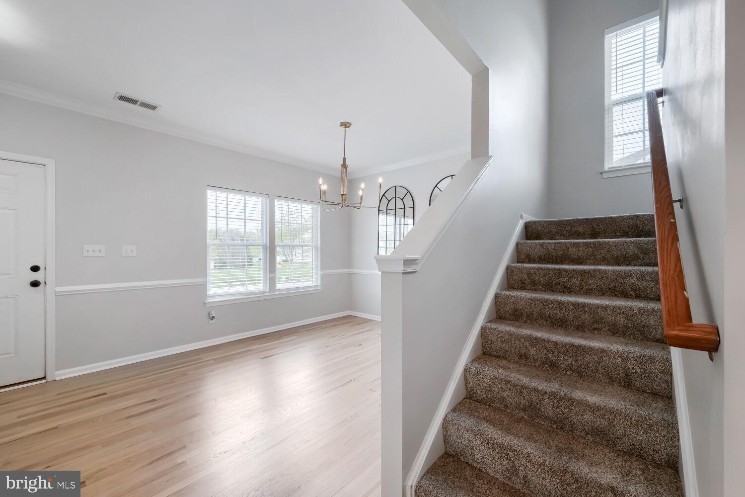 4216 Cross Spring Drive Nottingham, MD 21236 - Photo 8 of 47 a view of entryway and hall with wooden floor