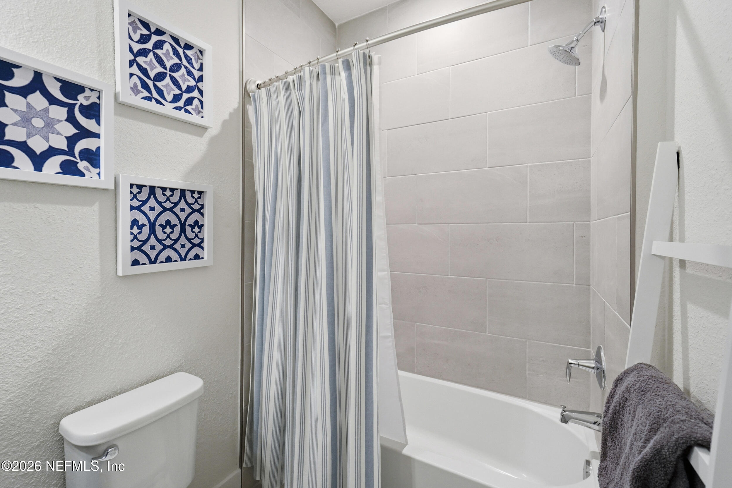 34 Red Rock Lane St. Johns, FL 32259 - Photo 42 of 71 a bathroom with a toilet and a bathtub