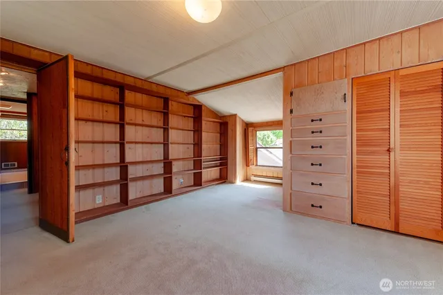 a view of a dining table and chairs