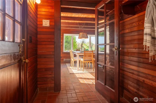 a view of a balcony with dining area